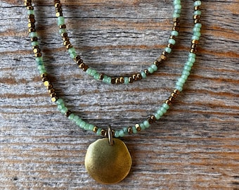 Layered Sage-Green Seed Bead Necklace – Dainty Boho Double Strand with Bronze Disc Pendant, Adjustable Length Gift for Her