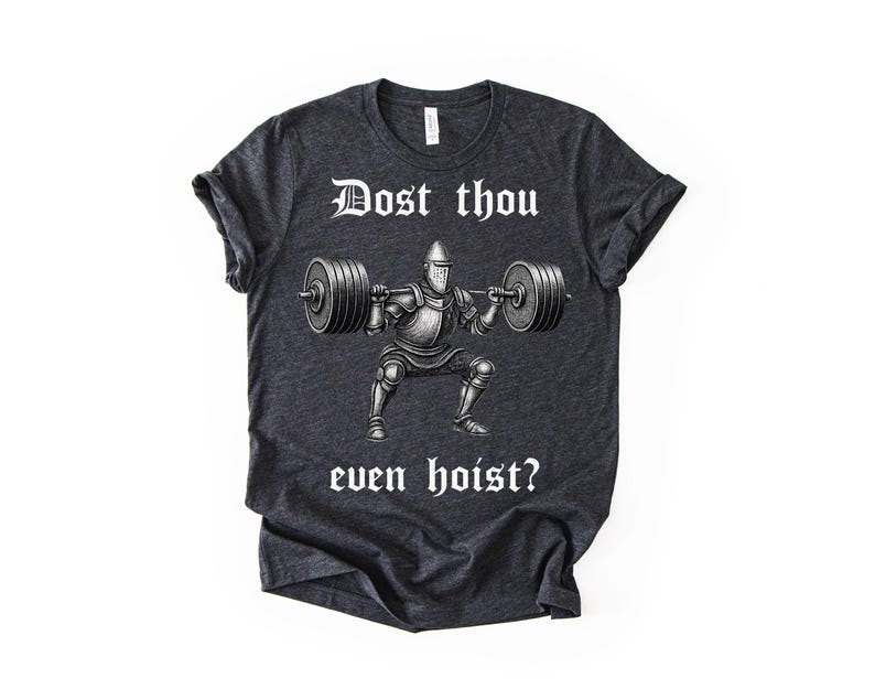 May include: Dark gray t-shirt featuring a weightlifting knight graphic. The knight is depicted in armor, squatting and lifting a barbell. The text "Dost thou even hoist?" is printed above and below the knight in a medieval font.