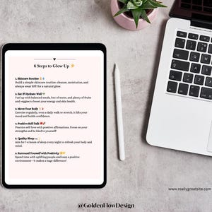 May include: A digital tablet displaying a list of six steps to glow up, including skincare routine, eating and hydrating well, moving your body, positive self-talk, quality sleep, and surrounding yourself with positivity. The tablet is on a white surface with a laptop and a pink potted plant.