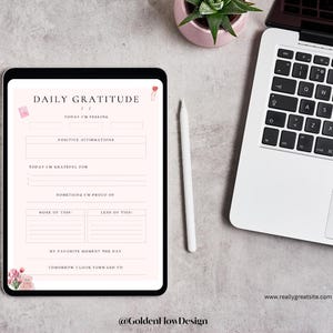 May include: A digital planner template with a pink and white background. The template includes sections for daily gratitude, positive affirmations, and more. The text "DAILY GRATITUDE" is at the top of the page.