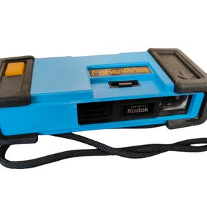 Cámara de película Fisher-Price 110 - Fabricada por Kodak