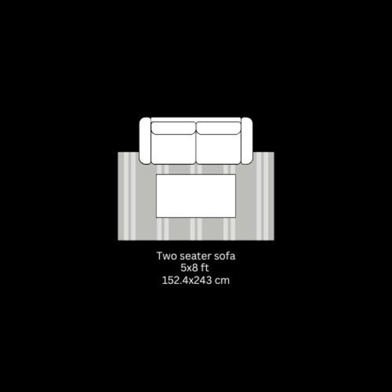 May include: Top-down view of a two-seater sofa, a rectangular coffee table, and a striped rug. The sofa is white, the table is rectangular, and the rug has vertical stripes. The text below reads: Two seater sofa 5x8 ft 152.4x243 cm.