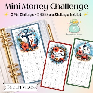 May include: A set of three mini money challenge cards with beach-themed designs. The cards feature an anchor, a ship's wheel, and a lighthouse, each with numbered circles for tracking savings. The cards are in a binder with a gold pen.