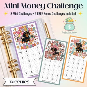 May include: A white binder with gold rings holds three colorful Mini Money Challenge cards. Each card features a dachshund illustration and numbered circles for tracking savings. The text "Mini Money Challenge" is at the top.