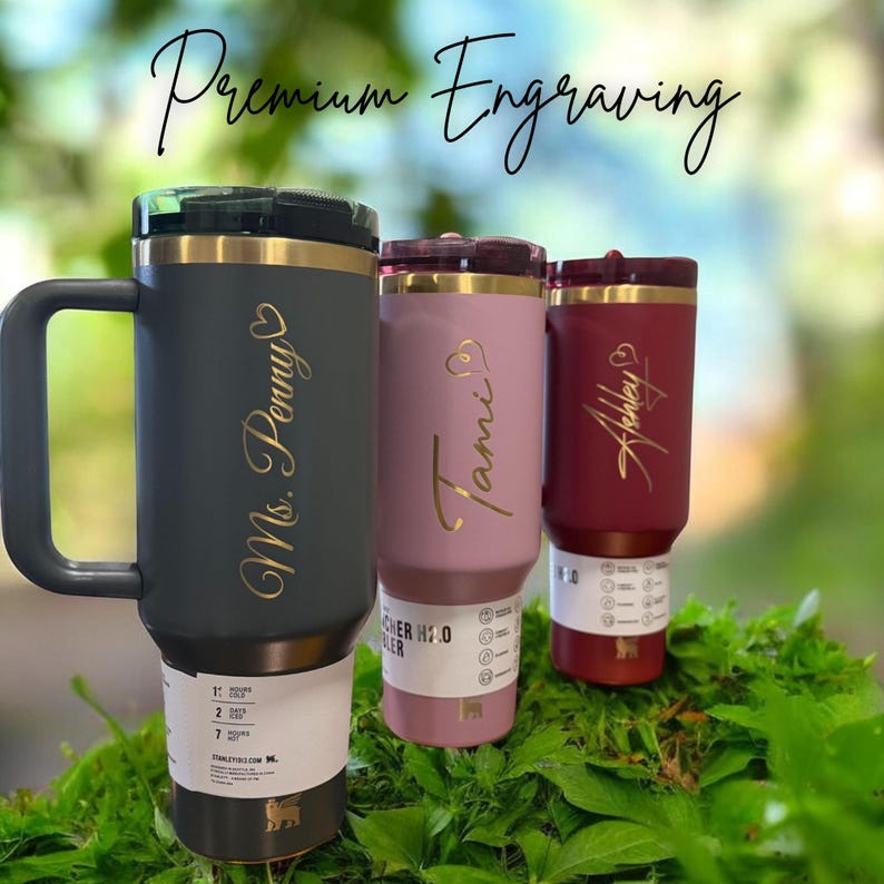 Personalized Stanley 40oz tumbler with handle and flip straw lid featuring custom name and design laser engraved on insulated stainless steel cup, perfect gift for her or him, reusable travel drinkware for hot and cold beverages with durable finish and stylish look, custom engraved tumbler ideal for birthdays, holidays and special personalized gifting