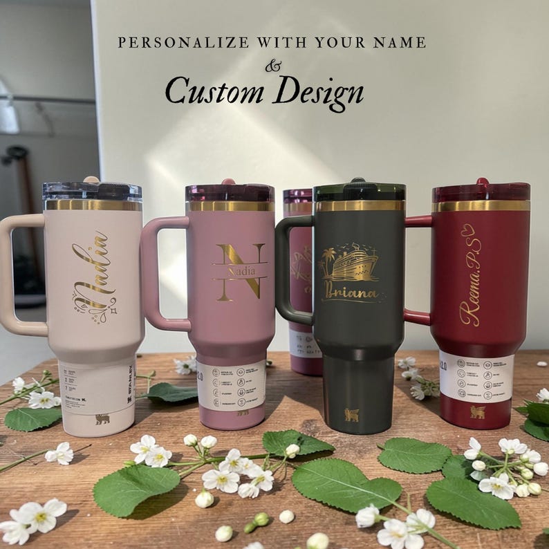 Personalized Stanley 40oz tumbler with handle and flip straw lid featuring custom name and design laser engraved on insulated stainless steel cup, perfect gift for her or him, reusable travel drinkware for hot and cold beverages with durable finish and stylish look, custom engraved tumbler ideal for birthdays, holidays and special personalized gifting