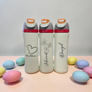 Personalized Owala 24oz FreeSip bottle with custom laser engraved name. A stylish and practical gift for daily use, travel, or everyday hydration.