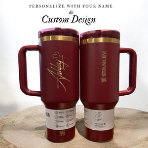 Personalized Stanley 40oz tumbler with handle and flip straw lid featuring custom name and design laser engraved on insulated stainless steel cup, perfect gift for her or him, reusable travel drinkware for hot and cold beverages with durable finish and stylish look, custom engraved tumbler ideal for birthdays, holidays and special personalized gifting