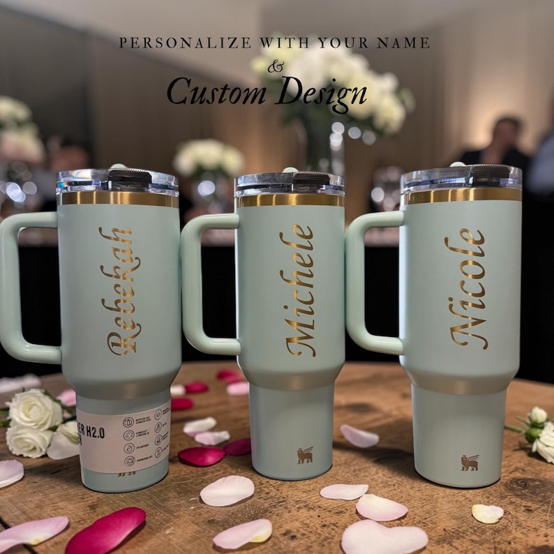 Personalized Stanley 40oz tumbler with handle and flip straw lid featuring custom name and design laser engraved on insulated stainless steel cup, perfect gift for her or him, reusable travel drinkware for hot and cold beverages with durable finish and stylish look, custom engraved tumbler ideal for birthdays, holidays and special personalized gifting