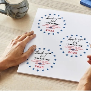 May include: Three printable thank you cards with a blue star border and the text "Thank you for your service, Land of the free because of the brave, 2025".