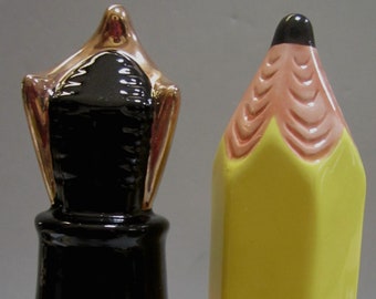 A Vintage 4-1/2 inch tall Ceramic Pair of Pen and Pencil Salt and Pepper Collectables  Style #971