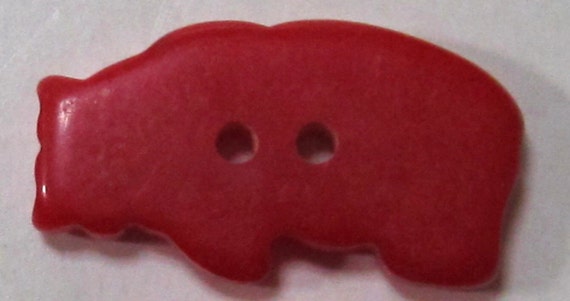 A Bakelite Catalin Polo Bear Button in Cherry Red