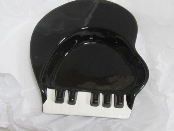 Several Vintage versions of the Sarsaparilla Piano Ashtray and one with the original LOGO! Ceramic body from 1980s, 7" x 8"