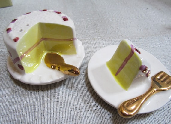 The Vintage Birthday Cake with a big slice of Birthday cake in a glazed ceramic material 3-1/2" long Salt and Pepper Shaker Set - Style #324