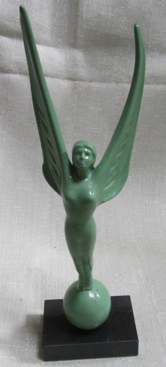 A Vintage WALDORF Astoria Hotel, NYC  paperweight "Spirit of Achievement" art deco 10" tall in several finishes, Made in the USA.
