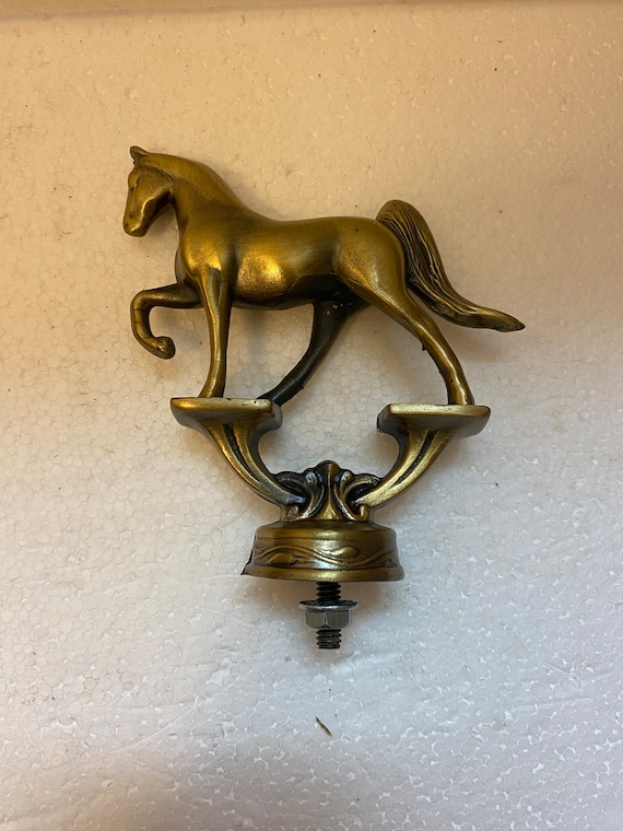 A Vintage Topper Gated Parade Horse motorcycle auto hood ornament 4-3/4" Tall mascot in several finishes