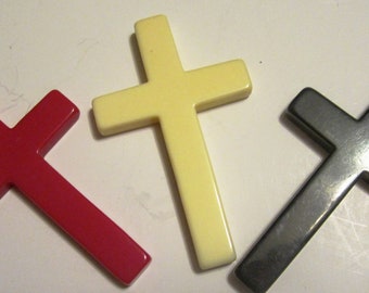 Vintage Bakelite / Catalin Cross in Yellow, Black, Red