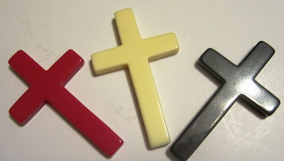 Vintage Bakelite / Catalin Cross in Yellow, Black, Red