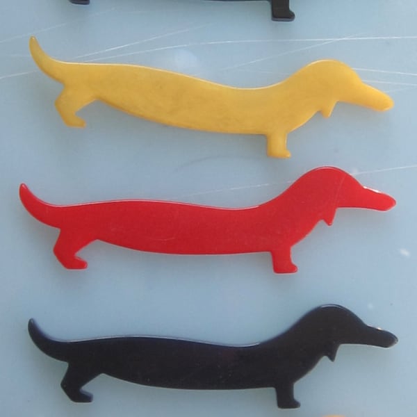 Vintage Bakelite Catalin Dachshund Dog jewelry Pieces 3-1/2" Long and comes in several colors. USA