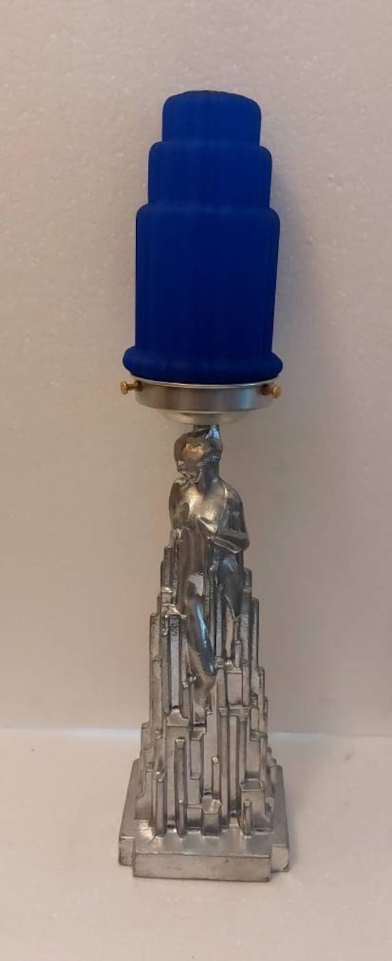 The SPIRIT of MODERNISM Lamp by Frankart Sarsaparilla is available in several finishes and is 20" tall - USA