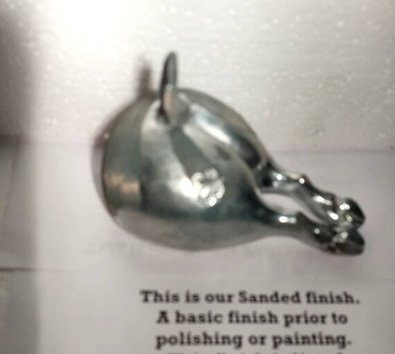 Topper of a Vintage car hood ornament Pig Hog rear butt ass with embossed Irish Shamrock in several finishes and in aluminum USA