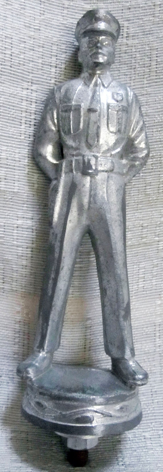 Topper hood ornament mascot 1950's Policeman 5-3/4" and in different finishes USA