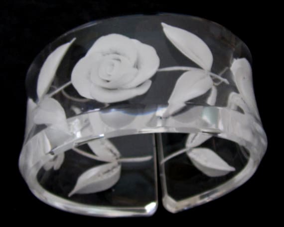 A Vintage Very Large Reversed  Carved  Oval Bracelet in Clear Lucite with White Roses and Leaves.