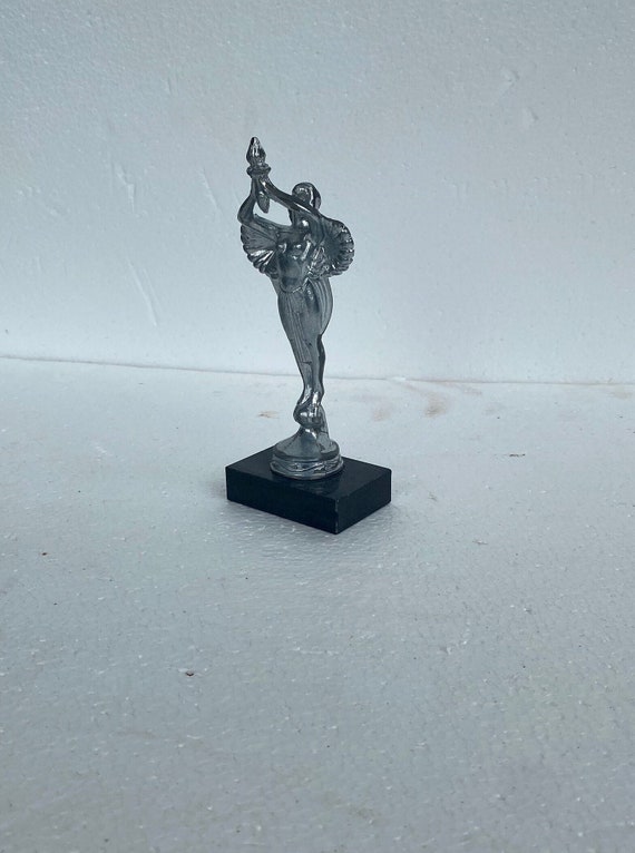 Vintage 7-1/2” Art Deco Angels with a Torch paperweights or trophies - all metal in several finishes - USA made