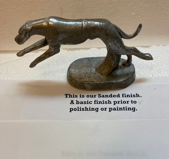 A Vintage Large 7" long Racing Greyhound dog bottle opener in several finishes Made in the USA