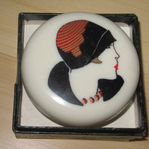 Vintage Bakelite Pill Box - A 1920's Lady Flapper with her Hat  by Sarsaparilla Deco Design in Cream and has a special quantity discount.