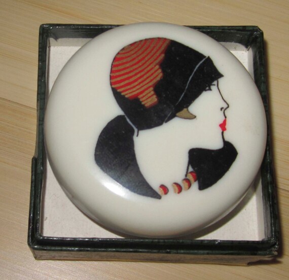 Vintage Bakelite Pill Box - A 1920's Lady Flapper with her Hat  by Sarsaparilla Deco Design in Cream and has a special quantity discount.