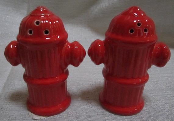 A Vintage Ceramic Double Red Hydrant Salt and Pepper Shaker with 3 holes.~ Item #976B