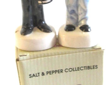 A Vintage pair of Train Engineer and Conductor Salt and Pepper Ceramic Shakers -  3-1/2" Tall - Style #351