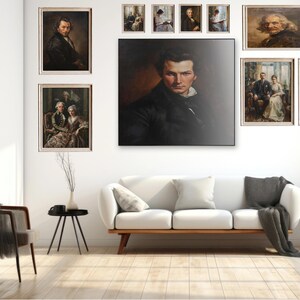 May include: A gallery wall arrangement featuring a large central portrait of a person in a dark coat, surrounded by ten smaller framed portraits and group paintings of individuals in historical attire, displayed above a white sofa with a gray throw.