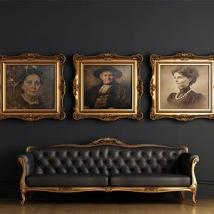 May include: A black tufted sofa with a gold frame positioned below three framed portraits in ornate gold frames. Two gold wall sconces are mounted on the dark wall on either side of the portraits, which depict three different individuals.