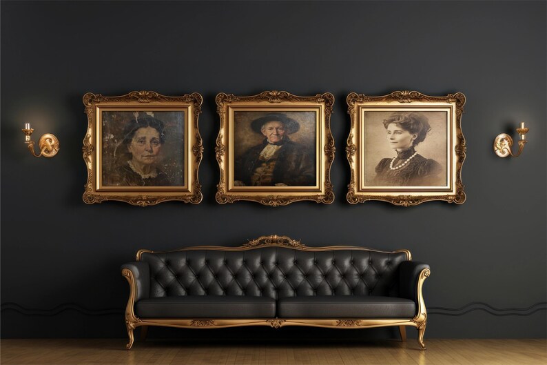 May include: A black tufted sofa with a gold frame positioned below three framed portraits in ornate gold frames. Two gold wall sconces are mounted on the dark wall on either side of the portraits, which depict three different individuals.