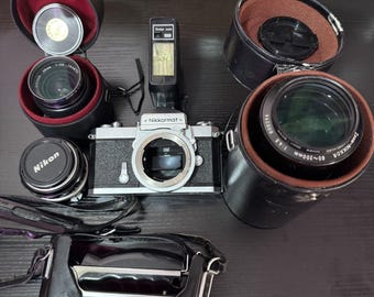 Vintage Nikkormat FT2 Filmkamera mit Nikkor 50 mm & 80-200 mm Objektiven + Blitzlicht (ungetestet)