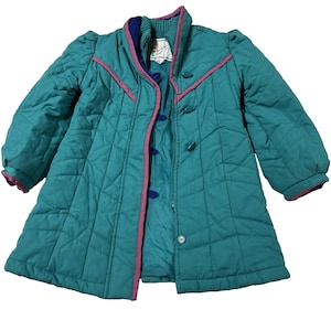 May include: Teal quilted coat with pink trim and blue buttons. The coat has a diamond pattern and a high collar. The sleeves are long and puffy. The coat is buttoned up the front and has a label on the inside.
