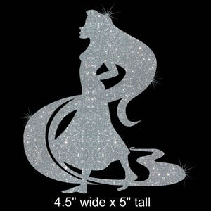 May include: Silver glitter iron-on design of a princess with long flowing hair. The design is 4.5 inches wide and 5 inches tall.