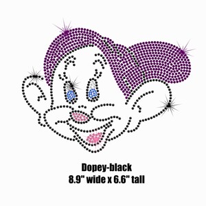 May include: A black and white rhinestone iron-on design of Dopey from Disney's Snow White. Dopey is wearing a purple hat and has a happy expression. The design is 8.9 inches wide and 6.6 inches tall.