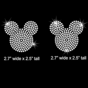 May include: Two silver rhinestone Mickey Mouse head designs, each measuring 2.7 inches wide by 2.5 inches tall.