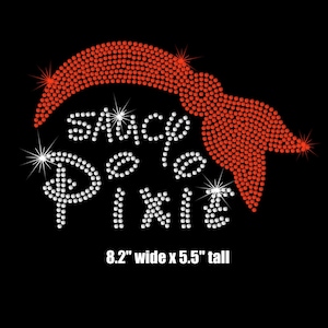 May include: A white rhinestone design on a black background with the text "Santa Pixie" and a red rhinestone bow. The design is 8.2 inches wide and 5.5 inches tall.