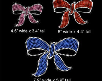 May include: Three rhinestone bow designs in pink, red, and blue, each outlined with clear rhinestones. The pink bow is 4.5 inches wide and 3.4 inches tall. The red bow is 6 inches wide and 4.4 inches tall. The blue bow is 7.9 inches wide and 5.9 inches tall.