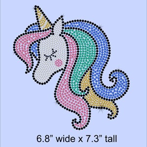 May include: A colorful rhinestone unicorn design with a pink, blue, green, and gold mane. The design is 6.8 inches wide and 7.3 inches tall.
