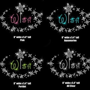May include: Four variations of a rhinestone iron-on design featuring a wishbone with a star on top surrounded by stars. The designs are 8 inches wide by 5.4 inches tall and are available in pink, aquamarine, peridot, and clear.