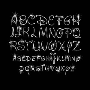 May include: A set of uppercase and lowercase letters made of white rhinestones. The letters are arranged in two rows, with the uppercase letters on top and the lowercase letters on the bottom.