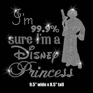 May include: A rhinestone iron-on design featuring a silhouette of a Disney princess with the text "I'm 99.9% sure I'm a Disney Princess" and a measurement of 9.5 inches wide by 8.5 inches tall.