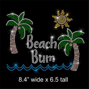 May include: Black graphic design featuring the words "Beach Bum" in white rhinestones, with palm trees, a sun, and ocean waves. The design is 8.4 inches wide and 6.5 inches tall.