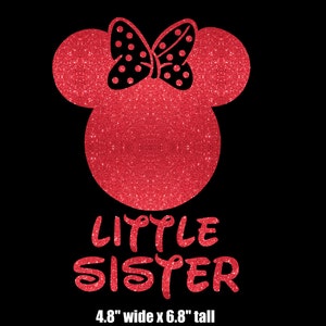 May include: Red glitter iron-on design featuring a Minnie Mouse head with a black polka dot bow and the text "LITTLE SISTER" in red glitter. The design measures 4.8 inches wide by 6.8 inches tall.