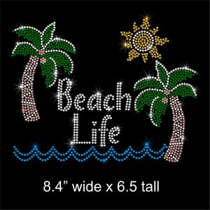 May include: Black graphic with the words "Beach Life", palm trees, a sun, and ocean waves, all made of sparkling rhinestones. The design is 8.4 inches wide and 6.5 inches tall.